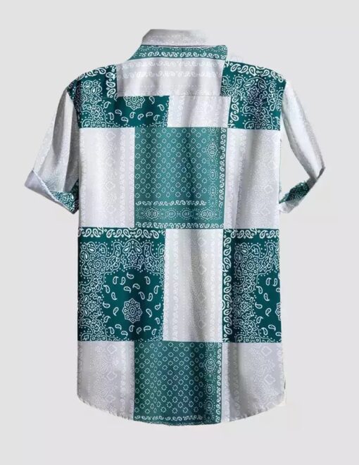 FLOWY FABRIC. REGULAR COLLAR. SHORT SLEEVE